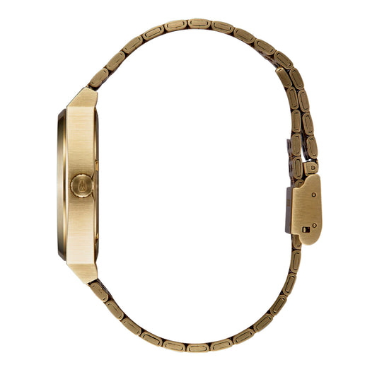 Nixon Time Teller Yellow Gold/Black/Red. Foto da lateral.