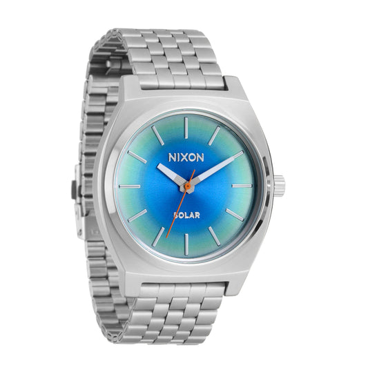 Nixon Time Teller Solar Silver/Rainbow. Foto da parte da frente a 3/4.