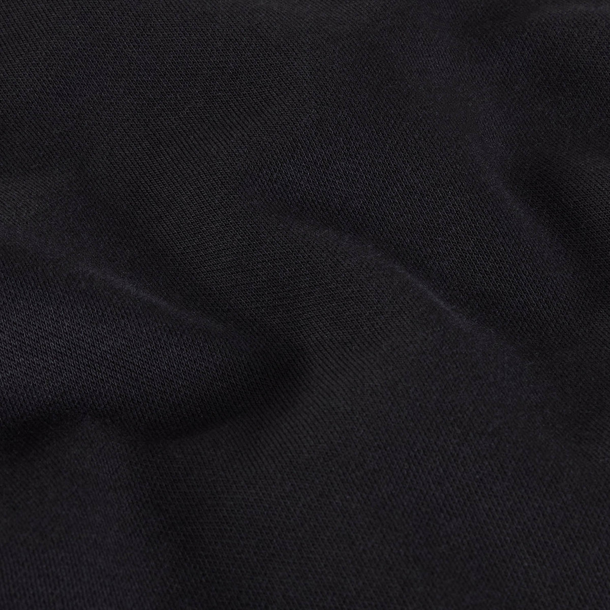Pormenor da textura da malha preta da sweat The North Face Off Piste Embro.