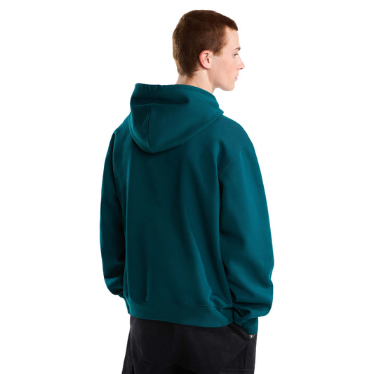 Vista traseira a três quartos da sweat The North Face Essential Simple Dome Pacific Teal num modelo, com capuz pousado nas costas.