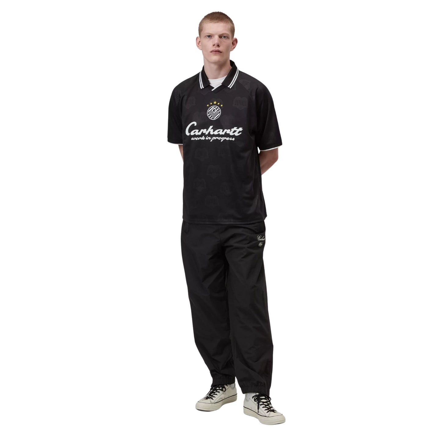 T-Shirt de futebol com manga curta para homem Carhartt WIP Terrace em Heart Train Jacquard, Preto. Foto da parte da frente, vestida.