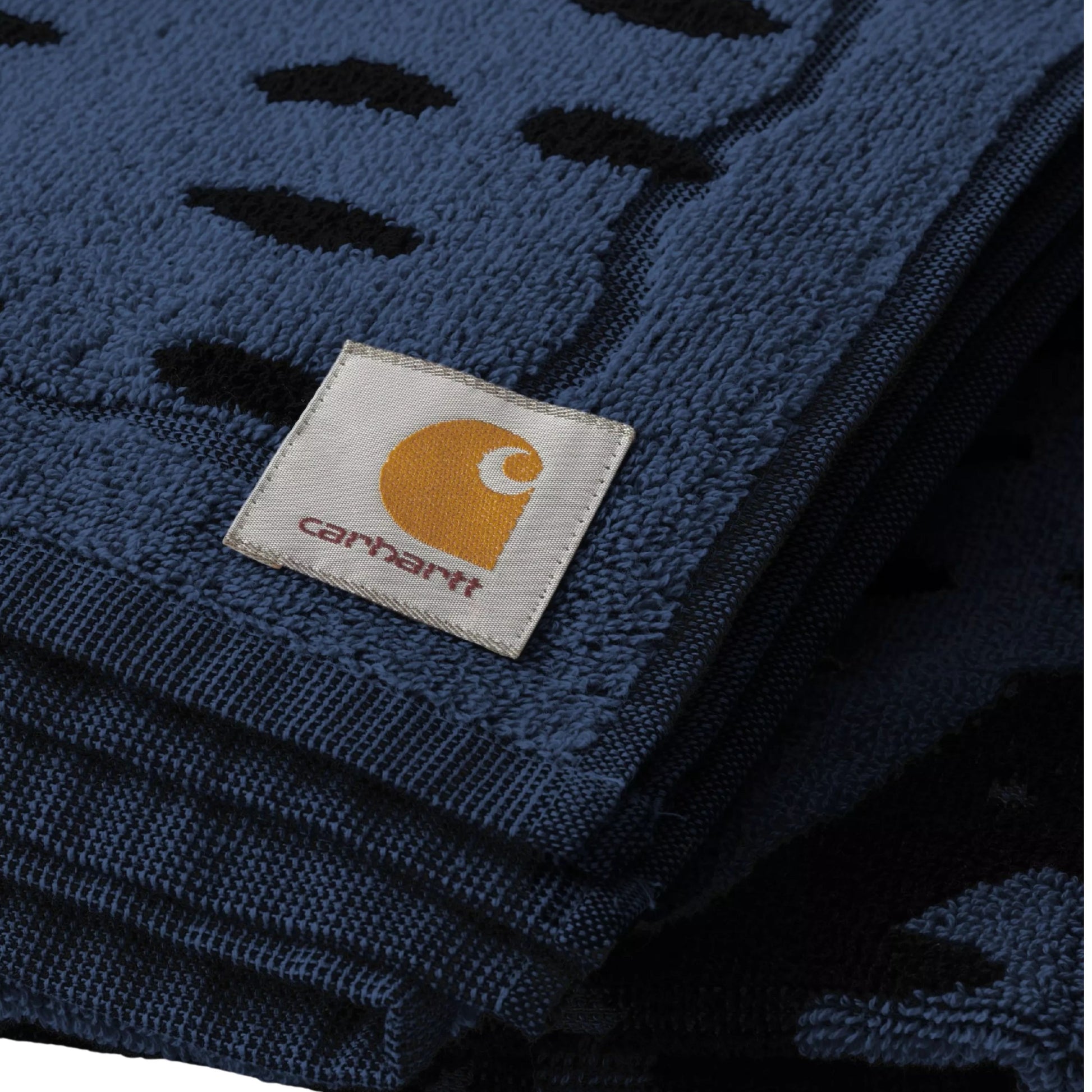 Toalha de praia Carhartt WIP Vestige em Blanket Vestige, Azul. Foto de detalhe do logotipo.