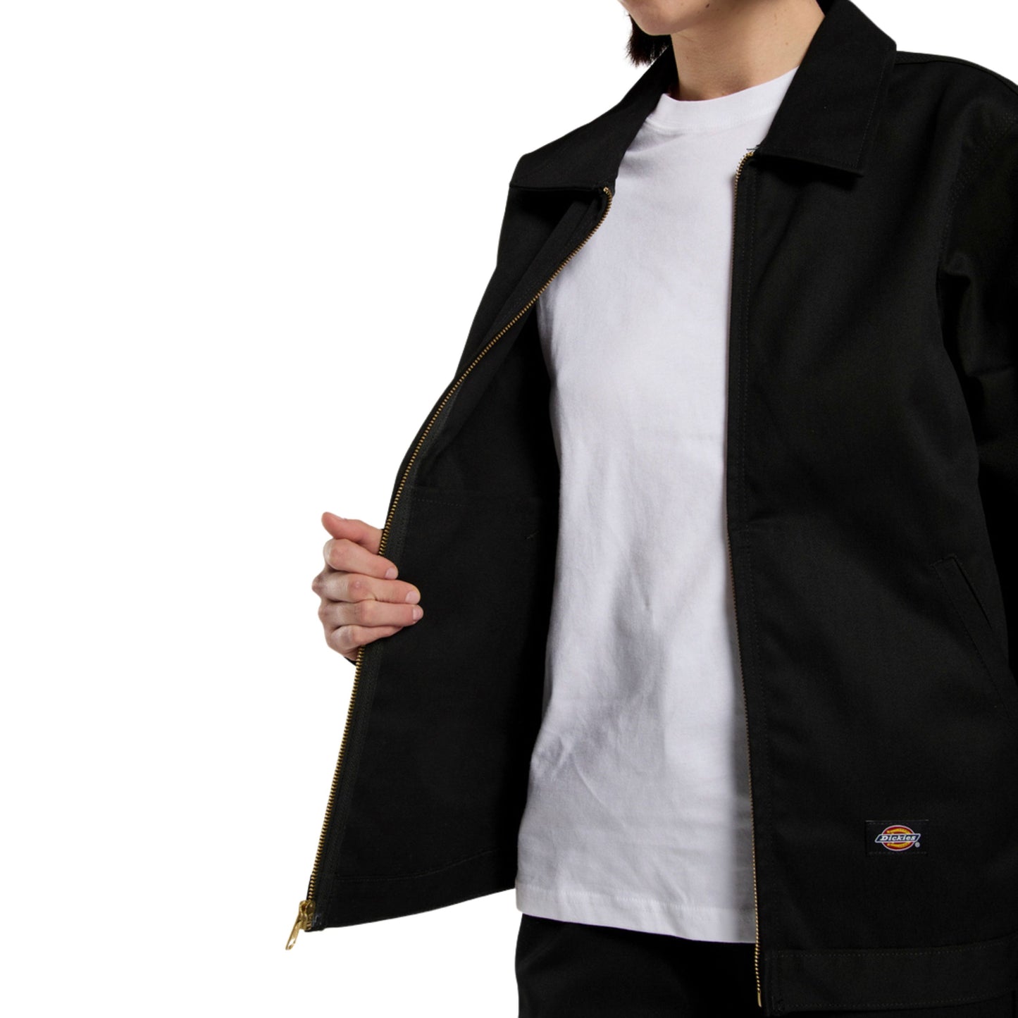 Casaco unissexo Dickies Unlined Eisenhower em Preto. Foto de detalhe da parte da frente, vestido.