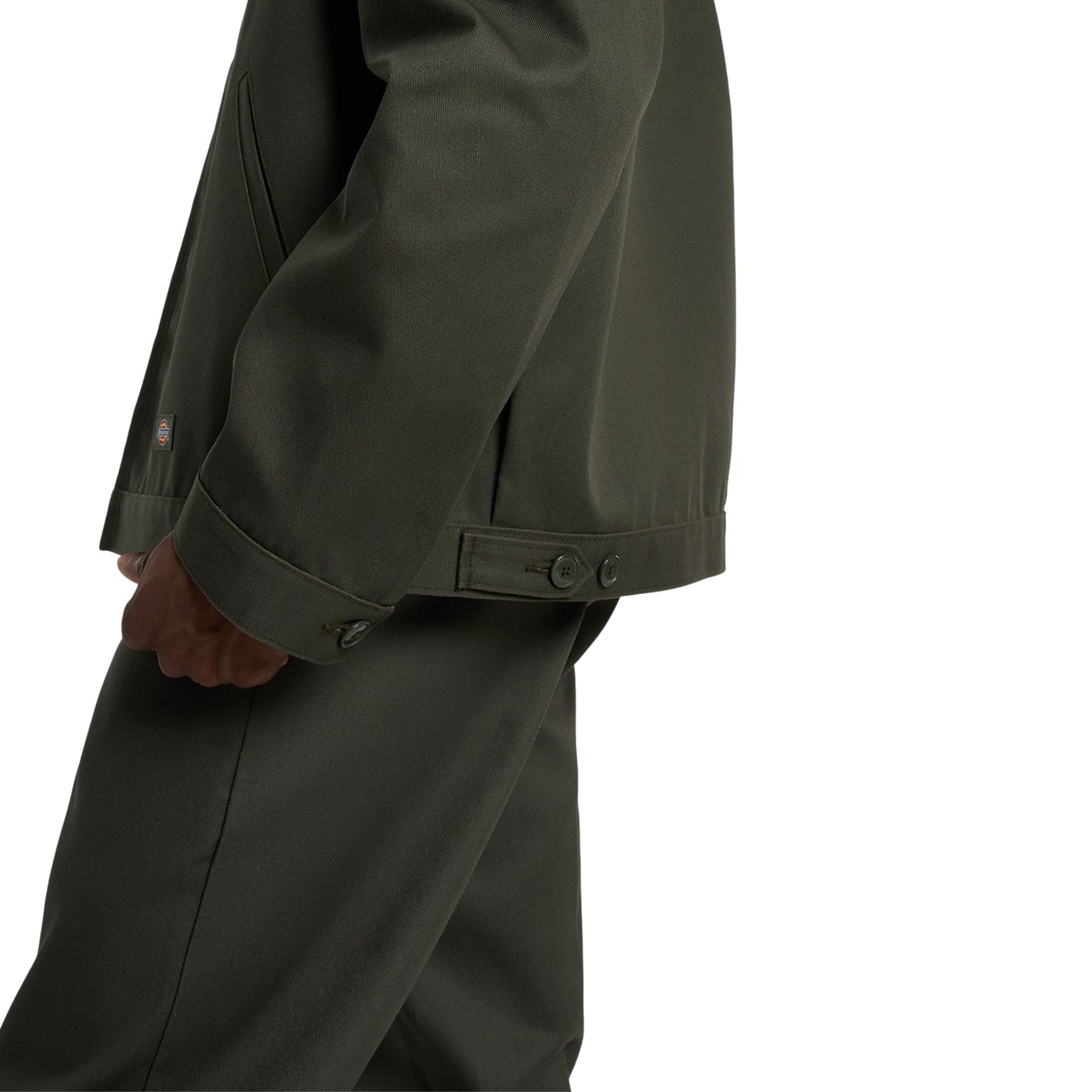 Casaco unissexo Dickies Unlined Eisenhower em Verde Olive. Foto de detalhe da lateral, vestido.