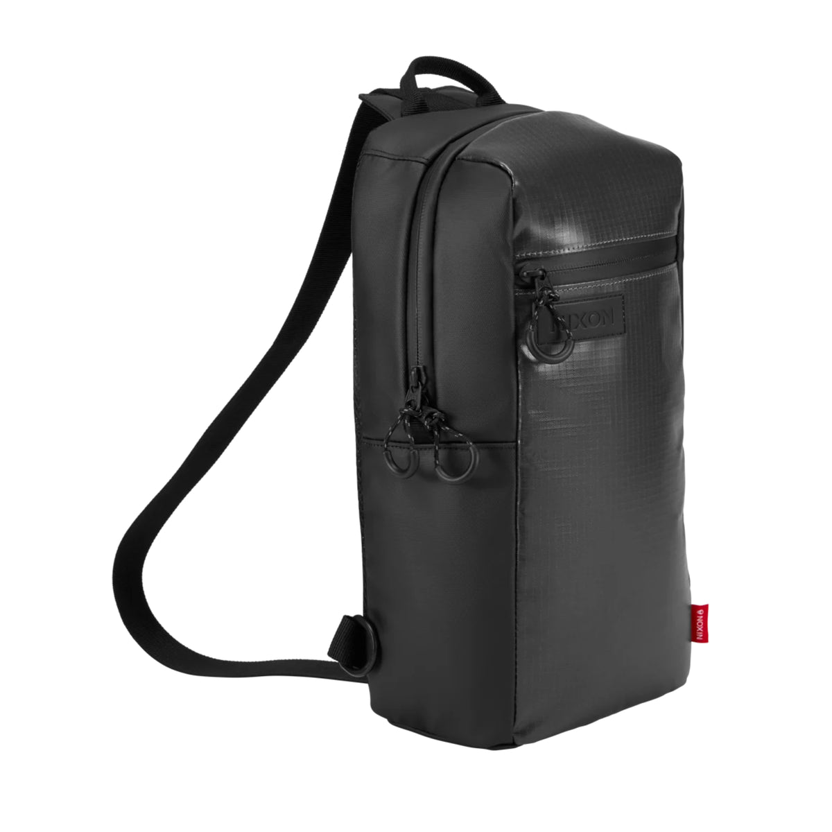 Vista de três quartos da bolsa Nixon Syndicate Sling Bag Asphalt, com alça de ombro, pega superior e fechos de correr.