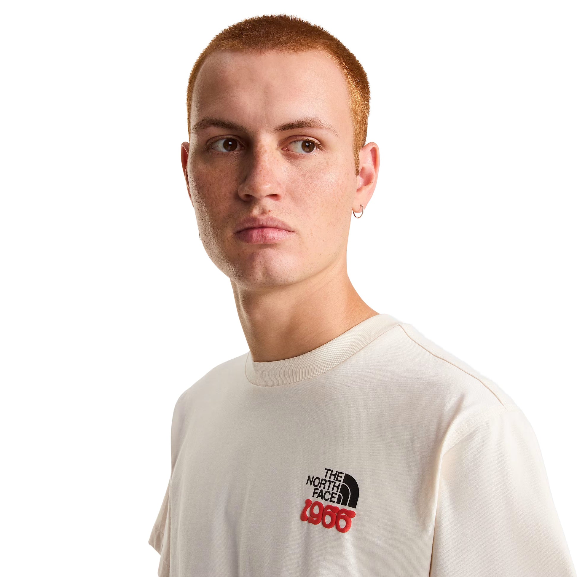 T-Shirt de manga curta para homem The North Face 1966 Motion Relaxed Graphic em Branco Dune. Foto de detalhe da parte da frente, vestida.