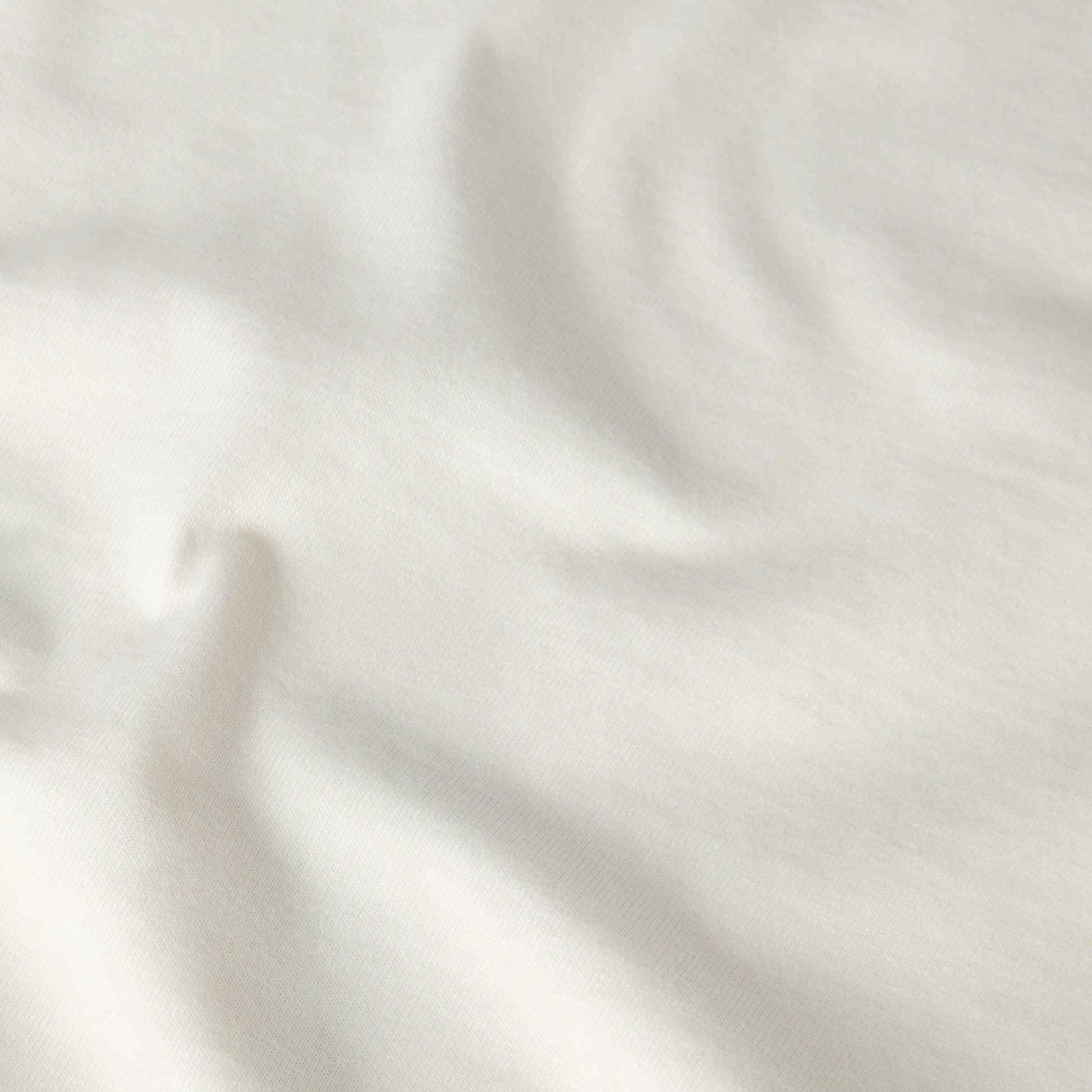 T-Shirt de manga curta para homem The North Face 1966 Motion Relaxed Graphic em Branco Dune. Foto de detalhe do tecido.