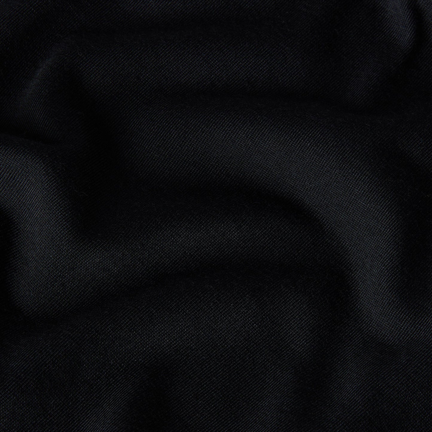 T-Shirt de manga curta para homem The North Face Bitmap Logo Graphic em Preto TNF. Foto de detalhe do material.