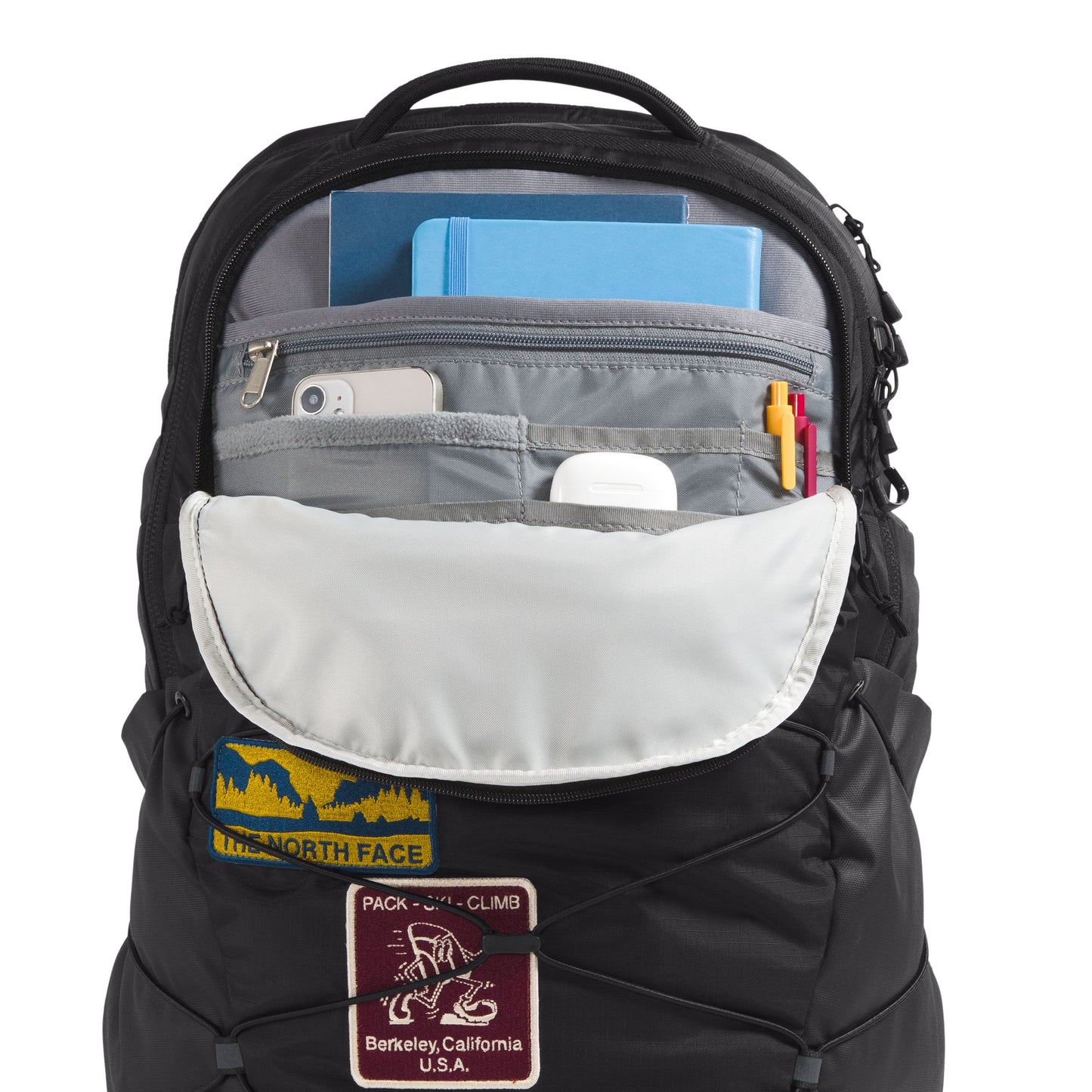 Mochila unissexo The North Face Borealis em TNF Black Patch/TNF White. Foto da parte da frente com bolsa aberta.