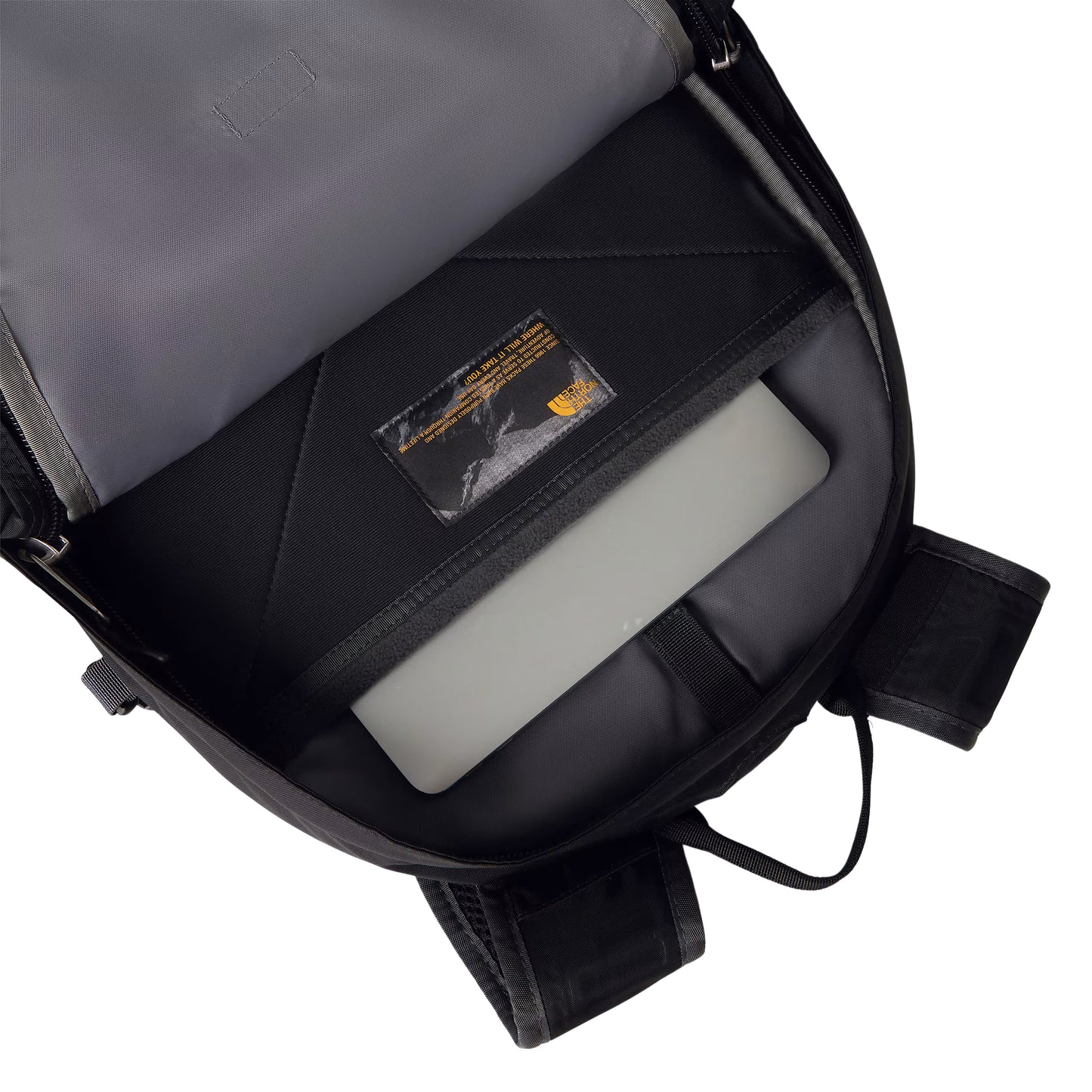 Mochila The North Face Borealis Classic em TNF Black / Asphalt Grey — interior do compartimento principal aberto, bolso acolchoado para laptop em Asphalt Grey com laptop cinzento inserido, etiqueta TNF dourada e alças FlexVent visíveis.