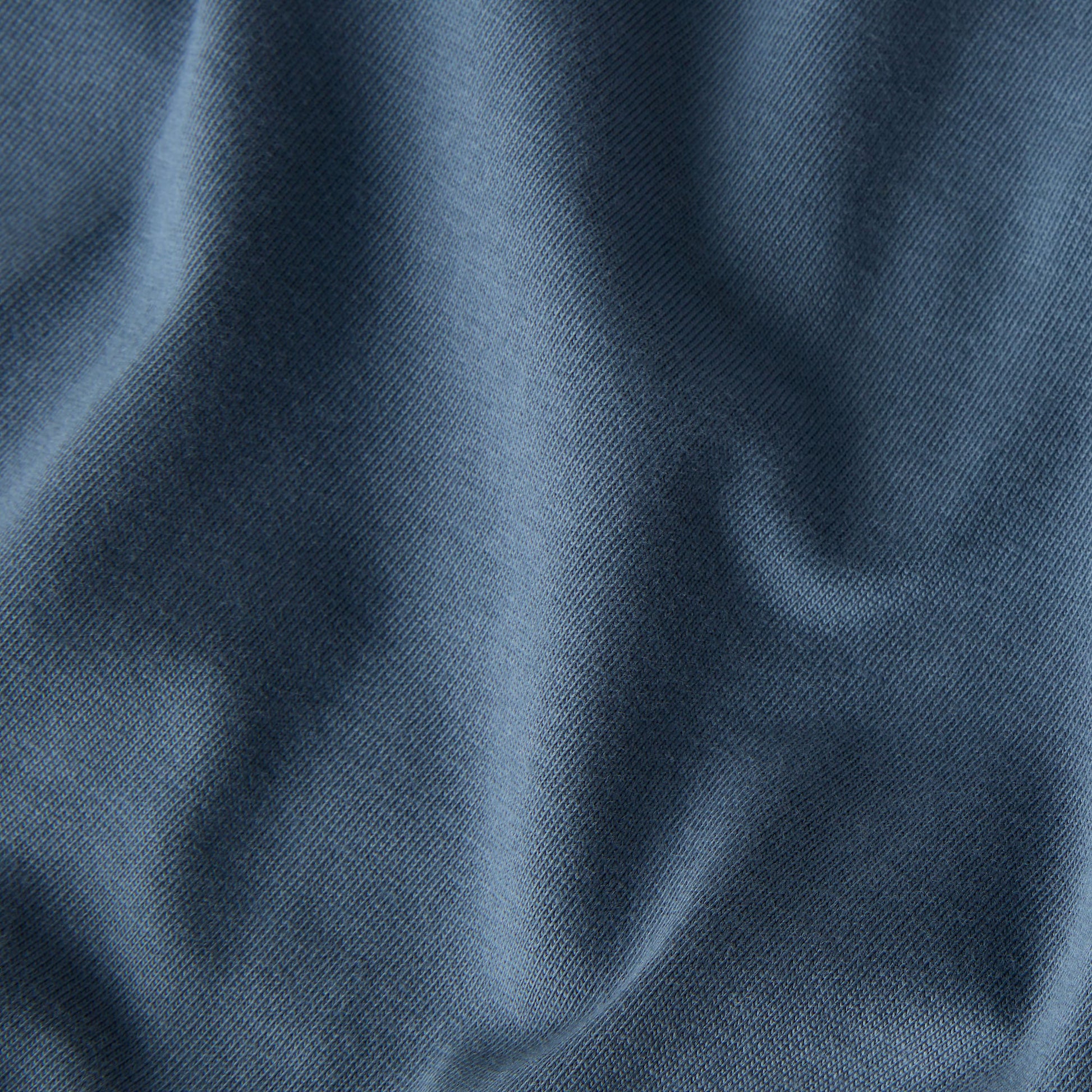 T-Shirt de manga curta para homem The North Face Icon Celebration Regular em Cinza Granite. Foto de detalhe do material.
