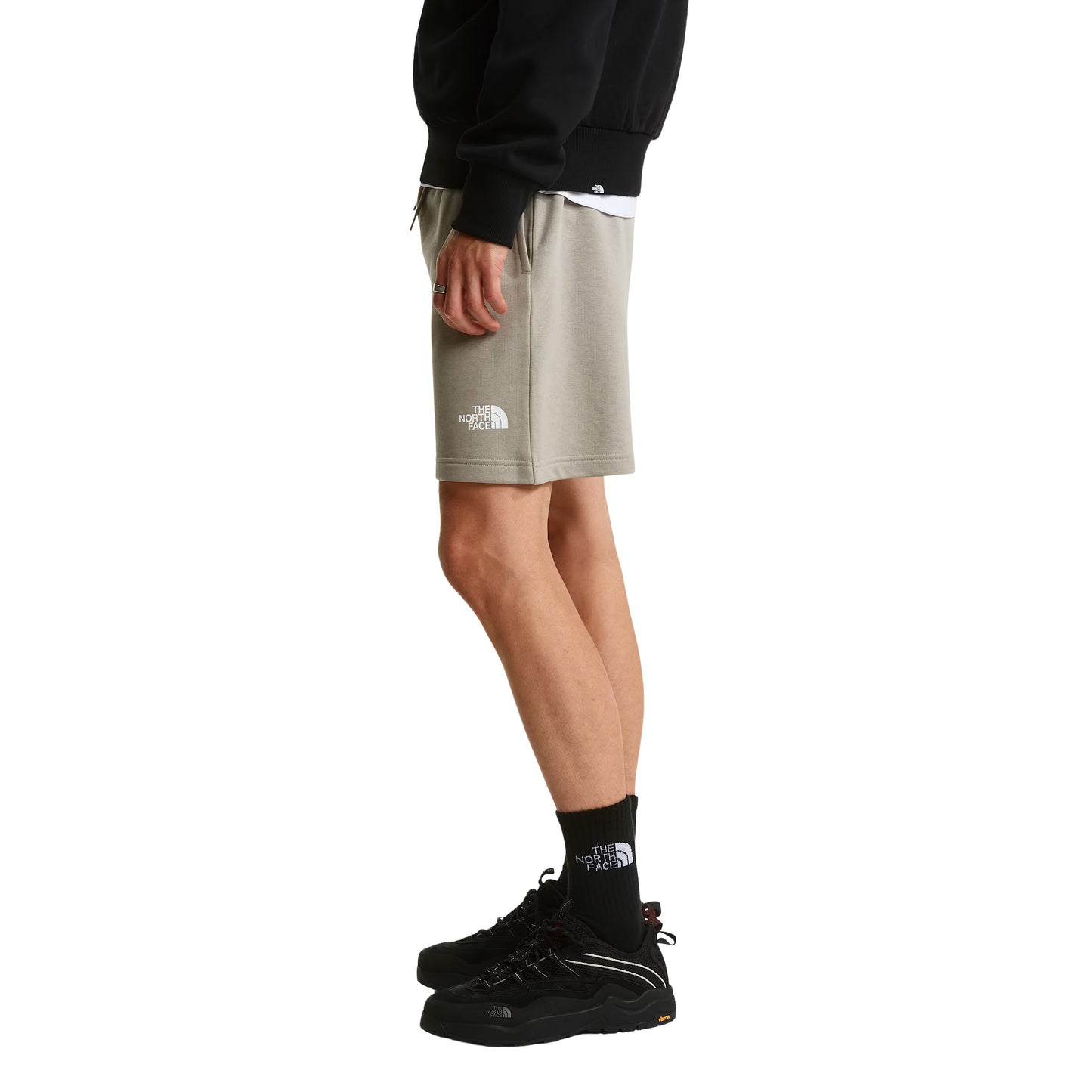 Calções para homem The North Face Simple Dome Light Regular em Stone Slab. Foto da lateral, vestidos.