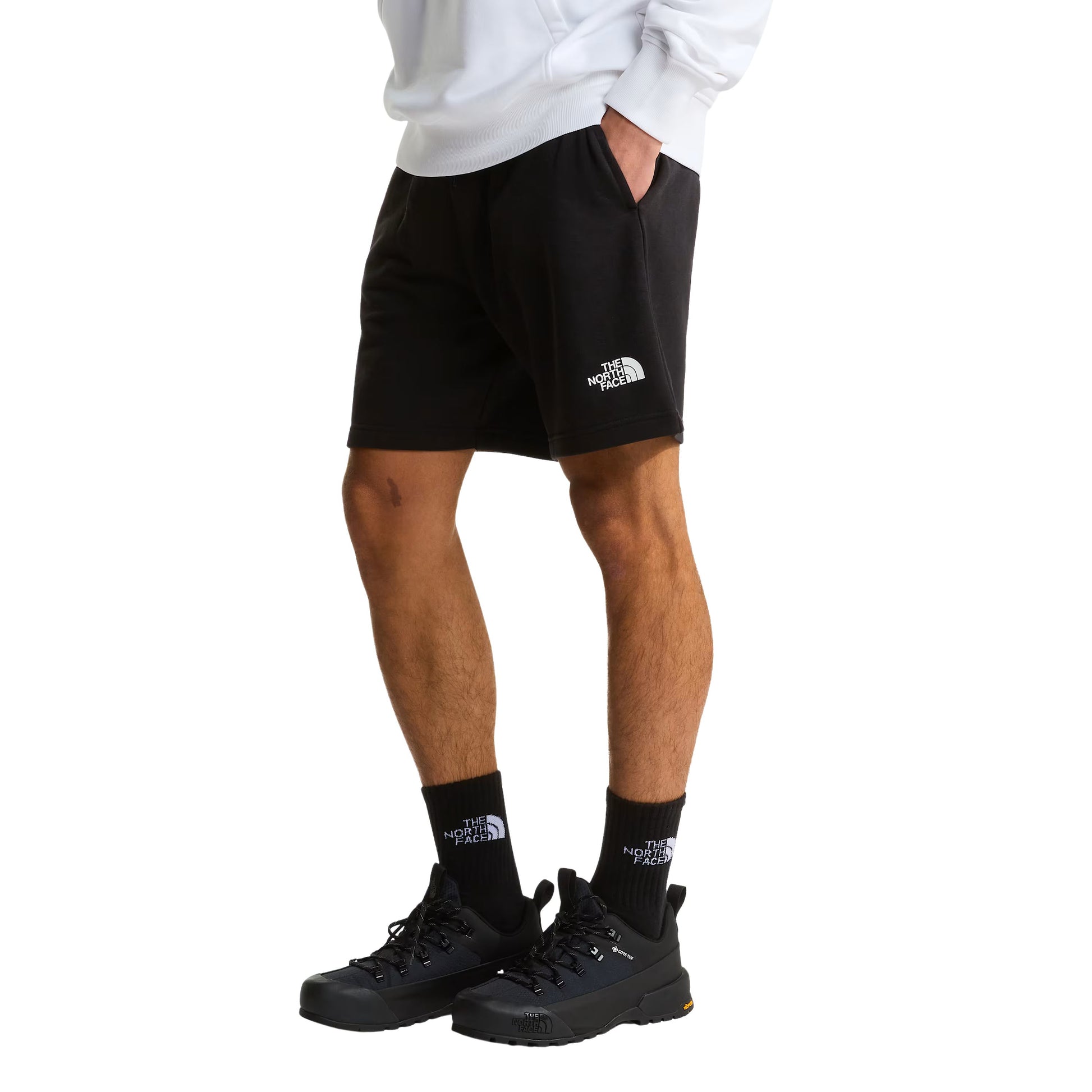 Calções de homem The North Face Simple Dome Light Regular em Preto TNF. Foto da parte da frente, vestido.