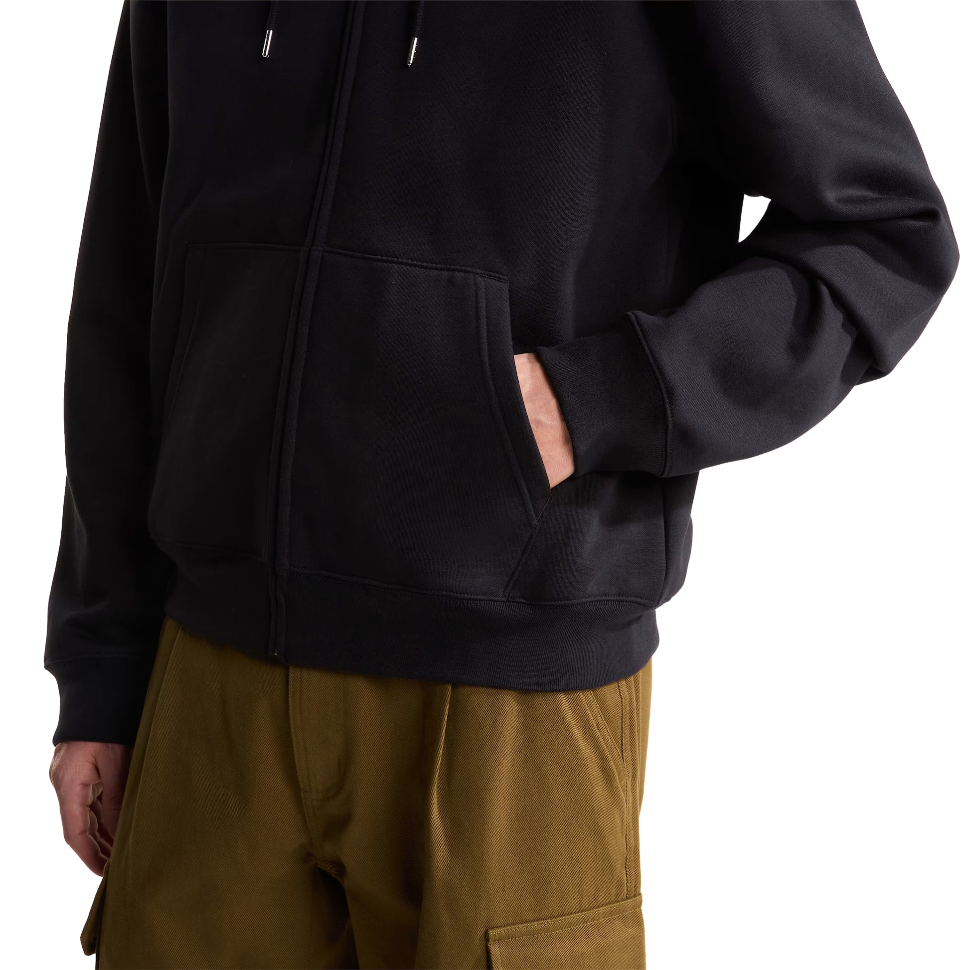 Hoodie The North Face TNF Essential Simple Dome Relaxed Full Zip em TNF Black — detalhe do bolso canguru dividido, fecho de correr integral prateado e bainha canelada em malha cardada preta visíveis, fundo branco.