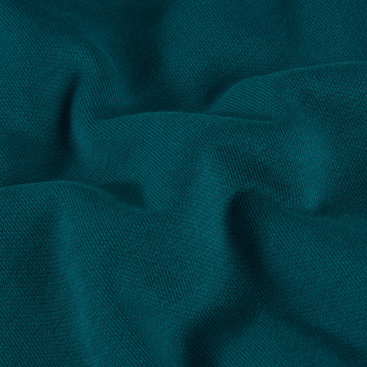Pormenor da textura do tecido em Pacific Teal da sweat The North Face Essential Simple Dome.