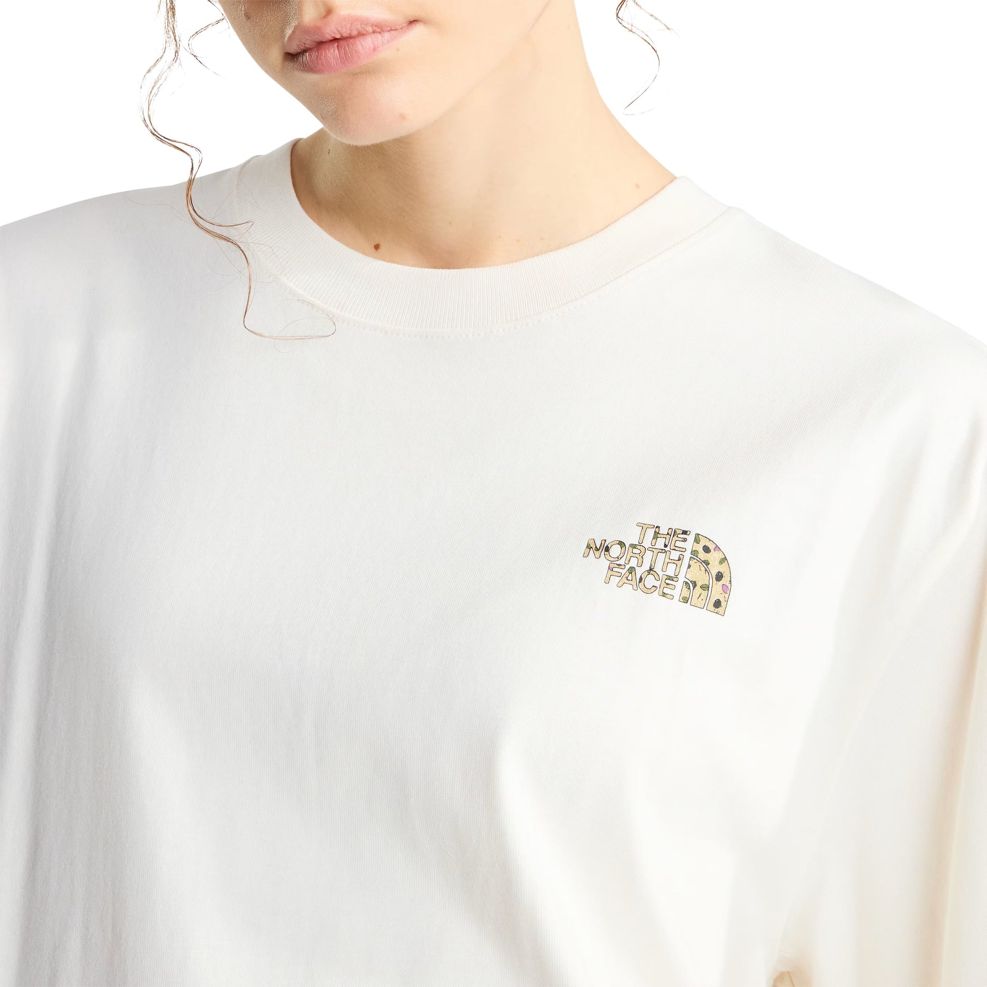T-Shirt de manga curta unissexo The North Face TNF Snack Relaxed Graphic em Branco Dune. Foto de detalhe da parte da frente, vestida.