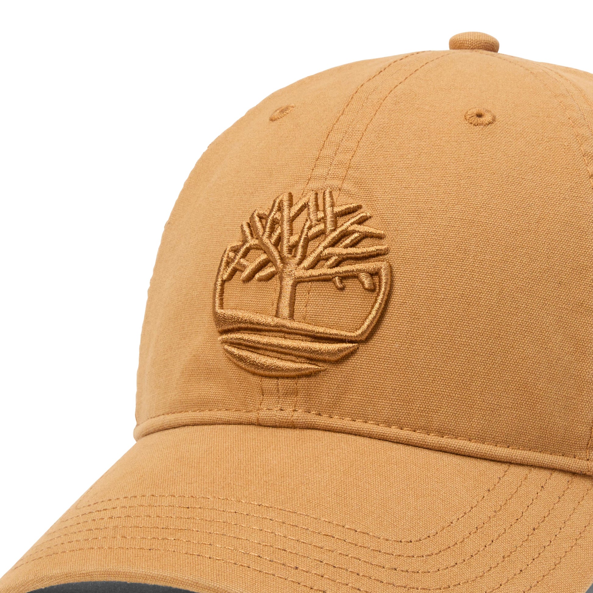 Boné unissexo Timberland Soundview Baseball em Wheat. Foto de detalhe da parte da frente.